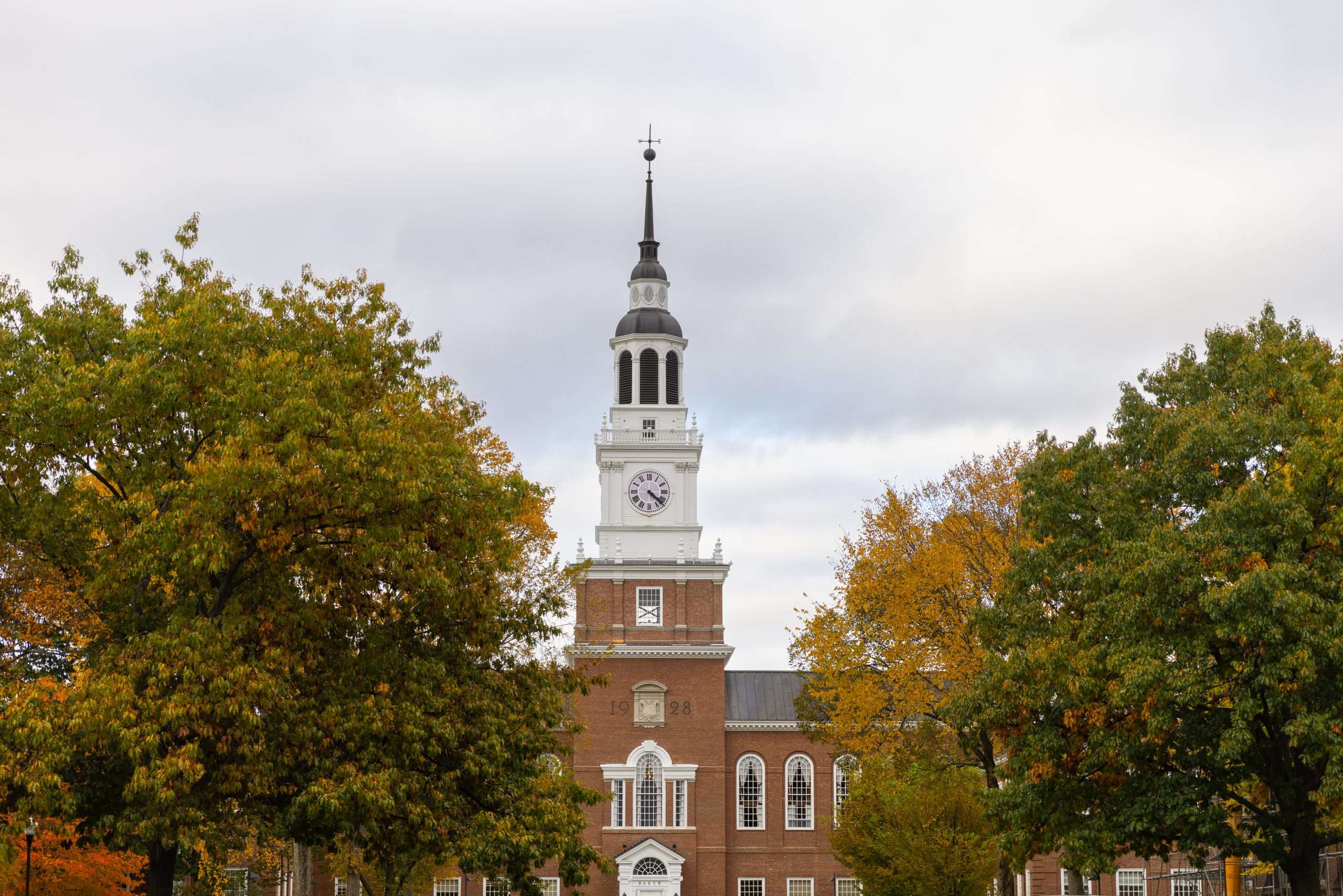 Baker Library is featured on a cloudy day at Dartmouth College.