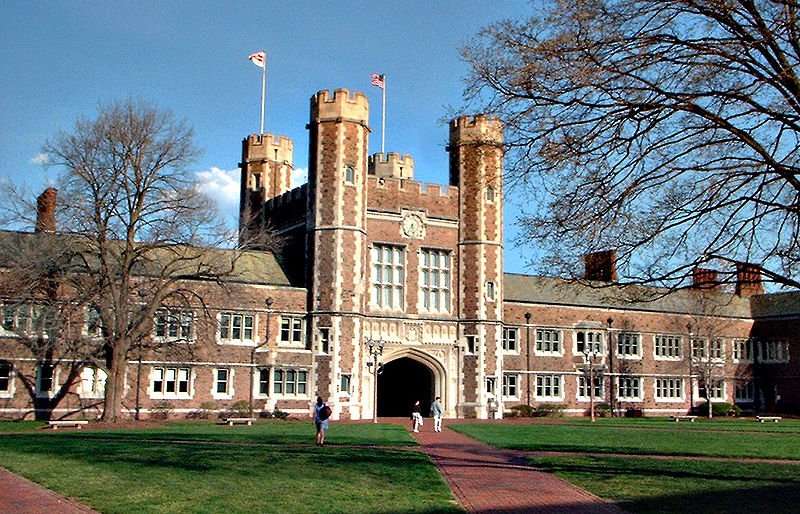 A brick building at Washington University in St. Louis is featured.